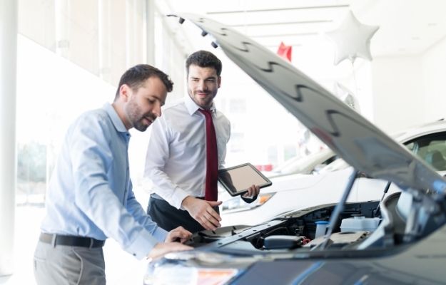 2 man looking at the car engine - How Discovery Search Works in Local Car Dealer Marketing | | How Discovery Search Work in Local Car Dealer Marketing | Auto Industry Update: Discovery Searches Turn One-Time Visitors into Lifetime Customers